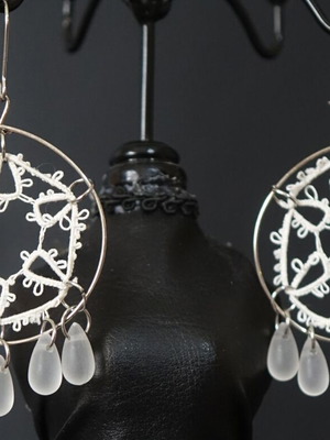 Handmade earrings with intricate design, new, white