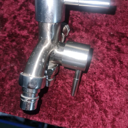 Double garden faucet like new, silver with valve