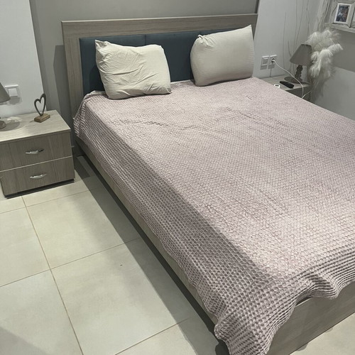 Double bed with two bedside tables