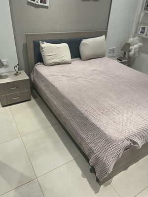 Double bed with two bedside tables