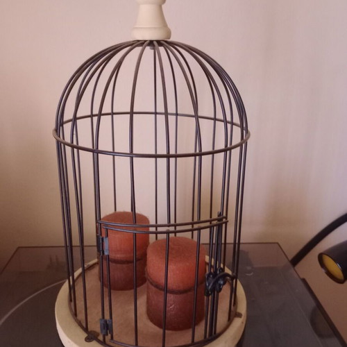Decorative metal birdcage like new with wooden base and candles