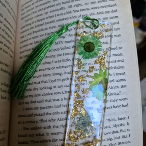 Handmade bookmark with green dried flowers in resin