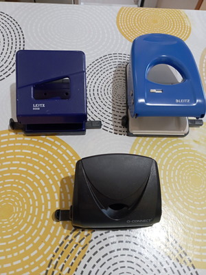 Pack of 3 hole punchers, 2 Leitz and 1 Q-connect