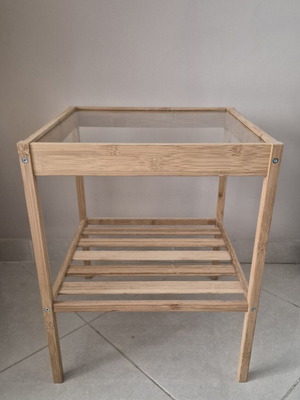 IKEA bamboo side table with glass surface, used