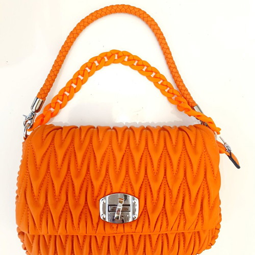 A.S. 98 embossed orange handbag with braided handle and chain