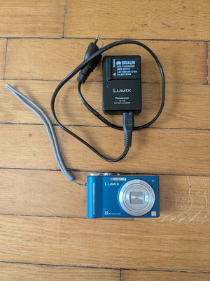 Panasonic Lumix DMC-ZX1 used camera missing battery/SD card door