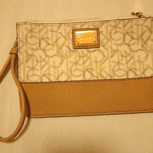 Calvin Klein Monogram Wristlet pouch cream and tan, like new