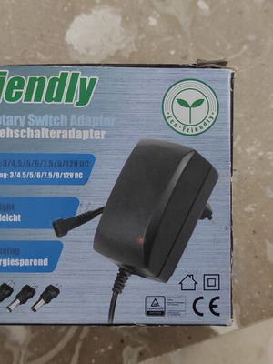 Eco-Friendly Rotary Switch Adaptor new, adjustable 3-12V 2250mA