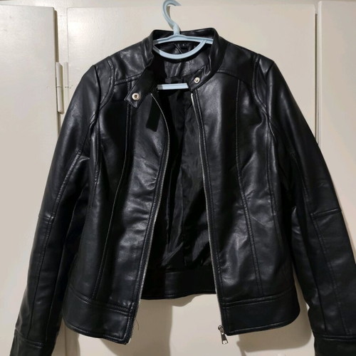 Short fitted black biker-style faux leather jacket like new