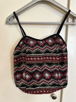Black top with embroidery and straps