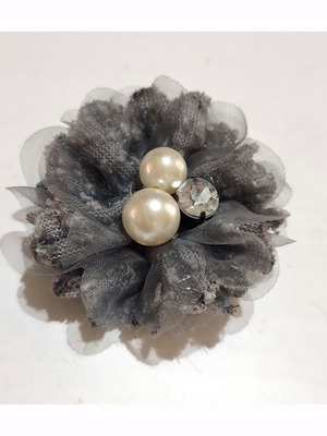 Gray boutonniere used with fabric petals, tulle, and faux pearls