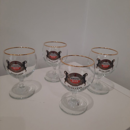 Amstel Bock beer glasses set of 4 with gold rim like new