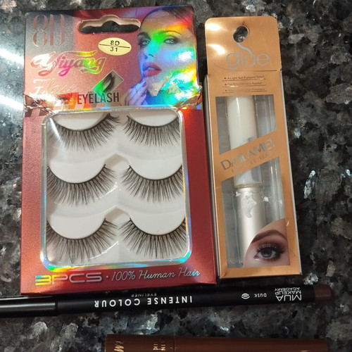 Eye Makeup Set like new with eyelashes, glue, brown pencil Mua, dip liner H&M