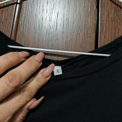 Black blouse with back opening like new, size S