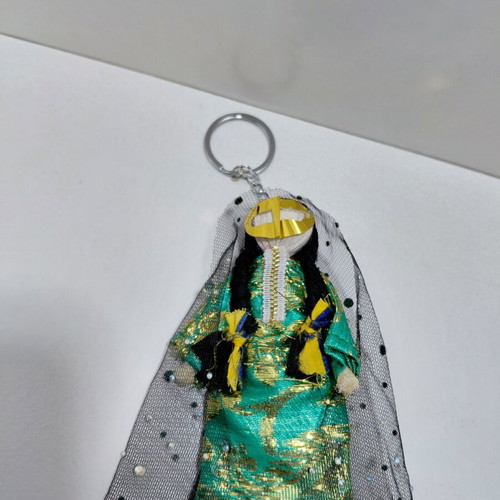 Traditional souvenir keychain doll from United Arab Emirates