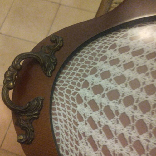 Serving tray used with wooden frame and brass handles