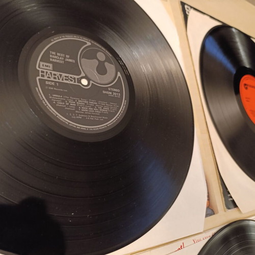 Collection of 3 vinyl records like new