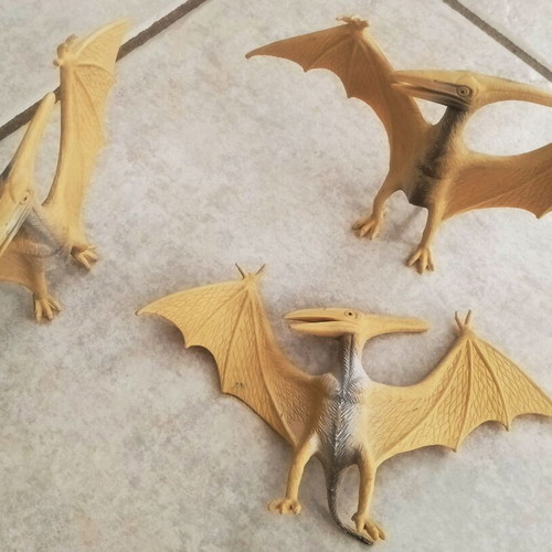 Dinosaur figure collection, pack of 18, including 2 with wheels