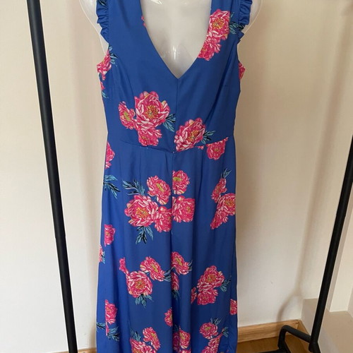 Paranoia jumpsuit L like new with flowers and open back