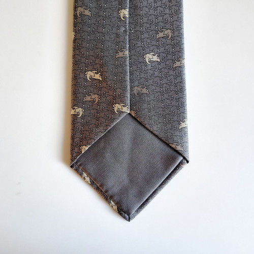 Hermes silk tie with elephant pattern, like new, gray beige