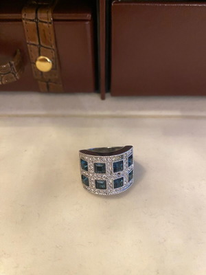 Ring like new with blue and silver stones