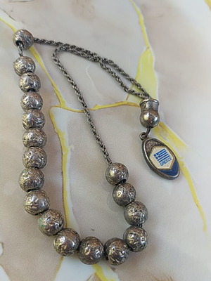 Komboloi with shiny silver color like new