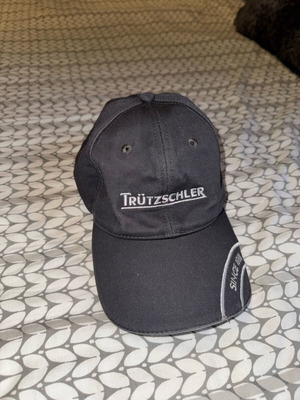Trützschler gray hat used with white embroidery