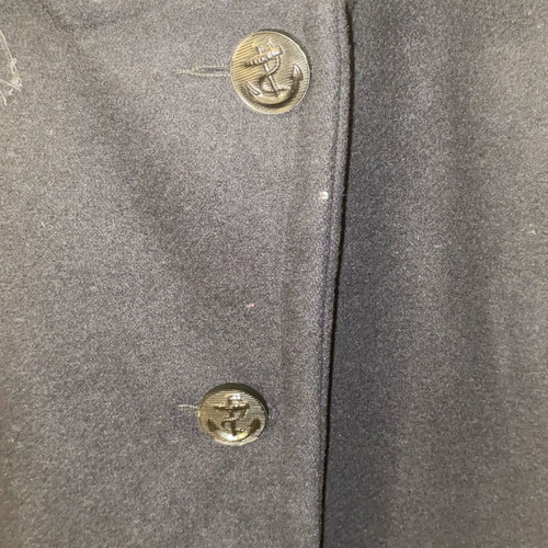 Navy coat authentic with collectible buttons from 1998