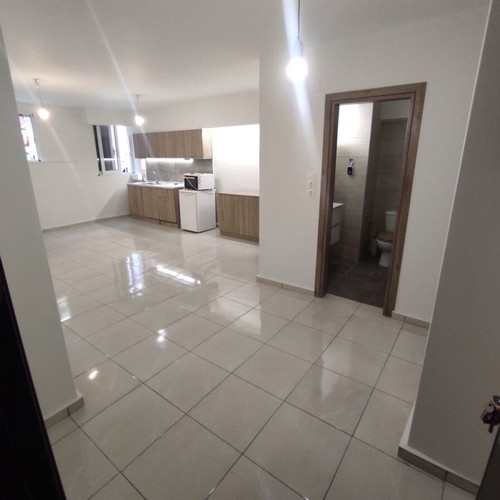 Apartment 65 sqm in Piraeus, ground floor with garden and security door