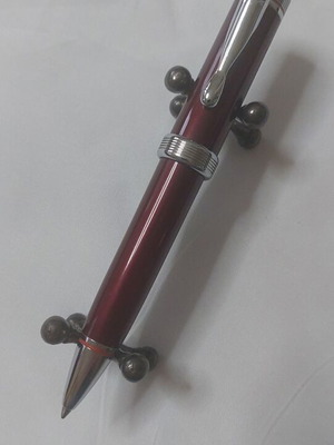 Harley Davidson pen used, burgundy