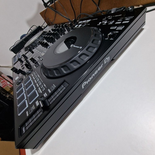 Pioneer DDJ-FLX10 DJ controller used with soft case and music collection