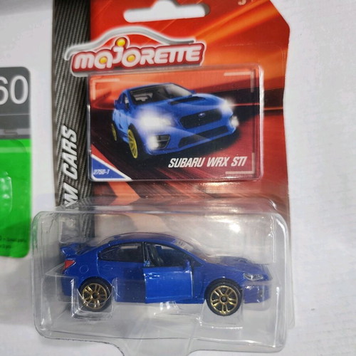 Set of 4 sport diecast cars new, various sizes