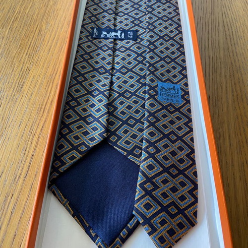 Hermes silk tie new with dark blue background