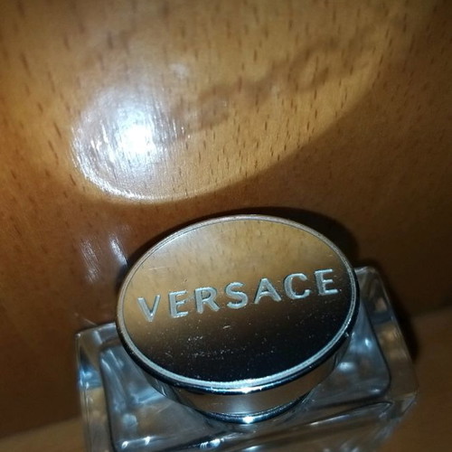 Empty Versense perfume bottle by Versace