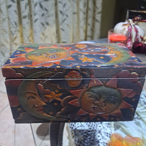 Wooden carved box like new with sun and moon design