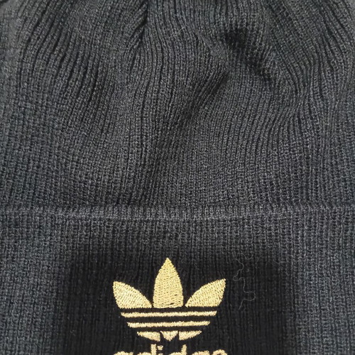 Adidas Originals black beanie with pom pom and gold logo