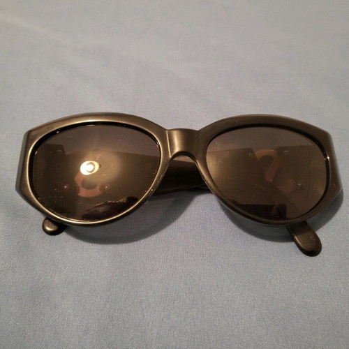 Yves Saint Laurent sunglasses used, black with gold logo
