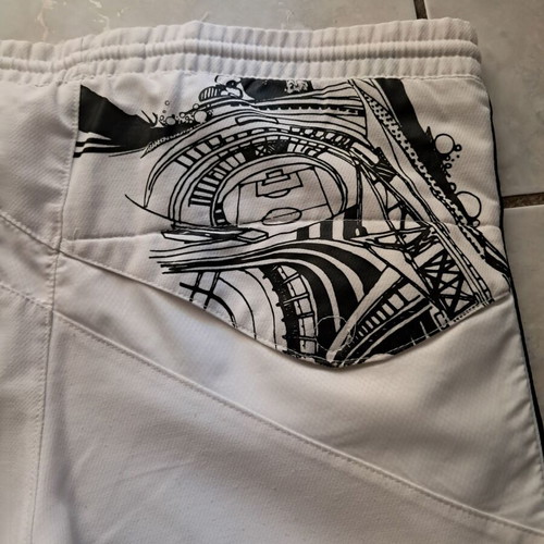 Adidas shorts used, white, 9-10 years, with back design and front pockets