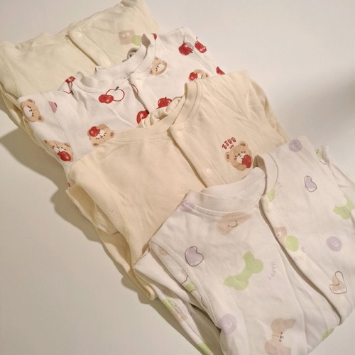 Labi Baby set of 4 full-body baby rompers like new 3-6 months
