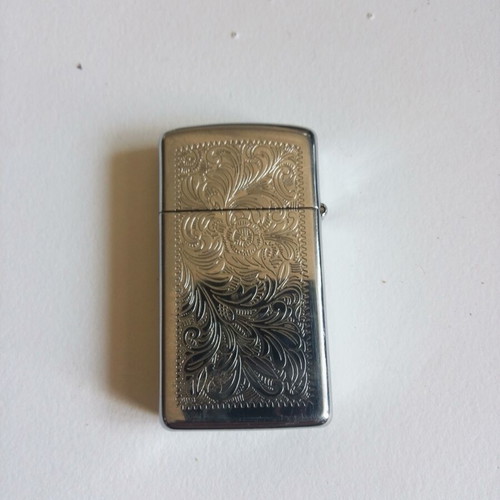 Zippo lighter used, functional, 3x5.5 cm