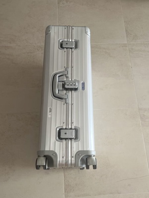 Rimowa travel bag used, silver color, slight defect