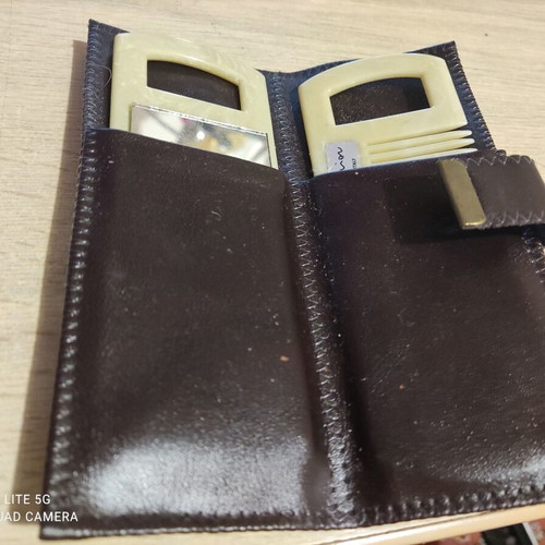 Comb and mirror in leather case like new