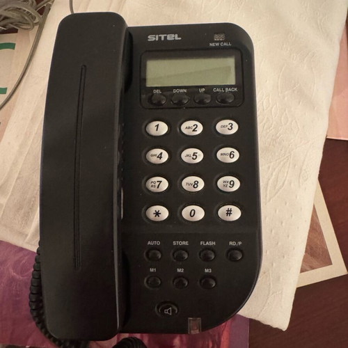 Telephone device like new, black wired