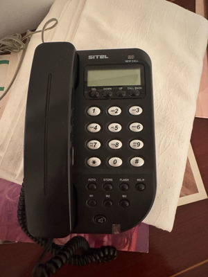 Telephone device like new, black wired
