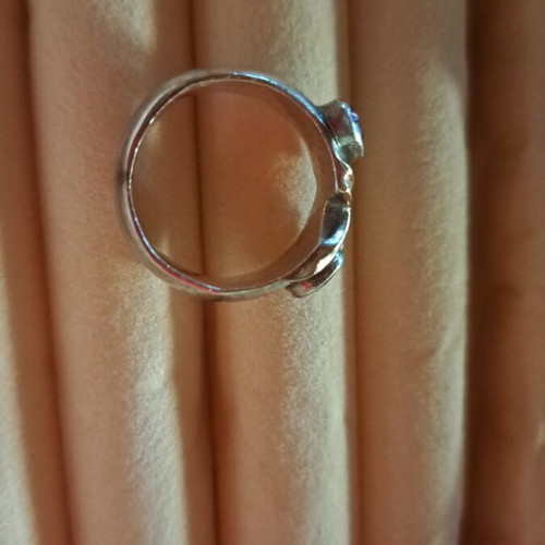 Silver ring like new with gold double X and amethyst, zircon stones