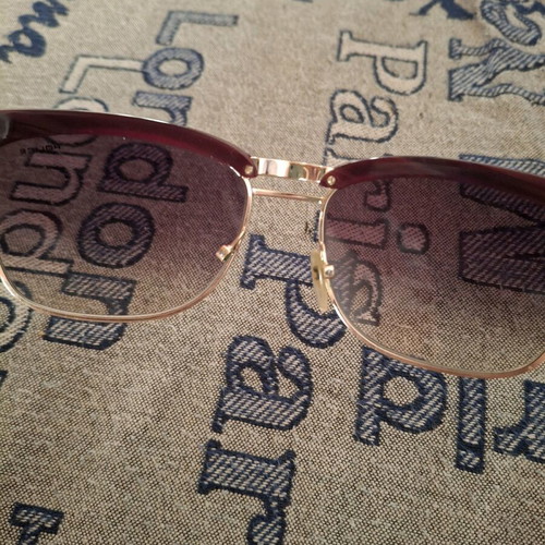 Police sunglasses like new, eggplant color with gold details