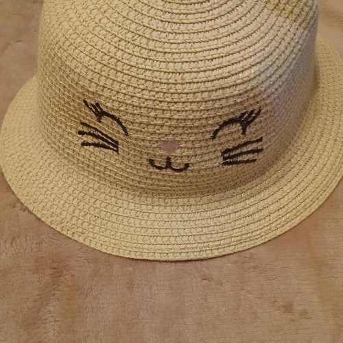 Set of two children's hats used, straw and swim cap