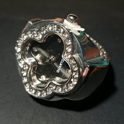 Four-leaf clover ring watch with crystals and black dial like new