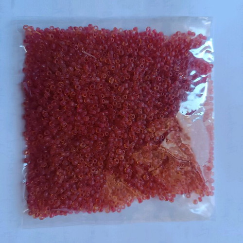 Small beads new, transparent red, 100 grams