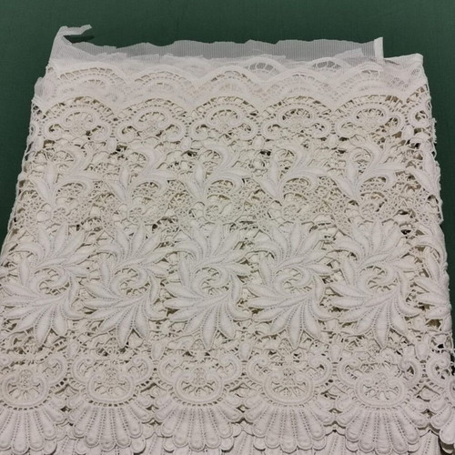 Cut lace used with designs for 1940s curtain